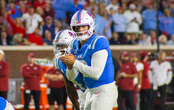 Ole Miss Rebels quarterback Jaxson Dart in the backfield with running back Quinshon Judkins vs. the Arkansas Razorbacks (2023).